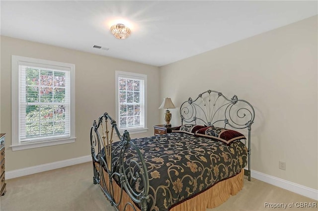 1708 Centennial Dr, Toano, VA 23168 - bedroom featuring light colored carpet and baseboards