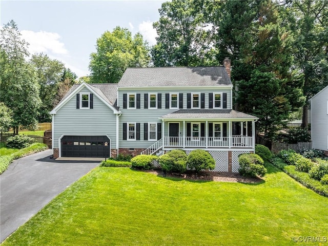 1537 Winbury Dr, Midlothian, VA 23114 - colonial home featuring a porch, asphalt driveway, a chimney, a shingled roof, and crawl space