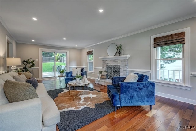 1537 Winbury Dr, Midlothian, VA 23114 - living area featuring ornamental molding, a brick fireplace, wood finished floors, and recessed lighting