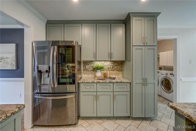 1537 Winbury Dr, Midlothian, VA 23114 - kitchen with stainless steel fridge with ice dispenser, washer / dryer, backsplash, light stone countertops, and ornamental molding