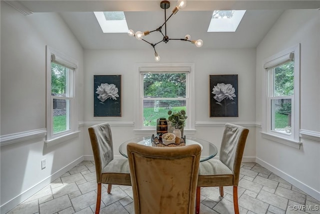 1537 Winbury Dr, Midlothian, VA 23114 - dining room featuring a skylight, a chandelier, healthy amount of natural light, and lofted ceiling