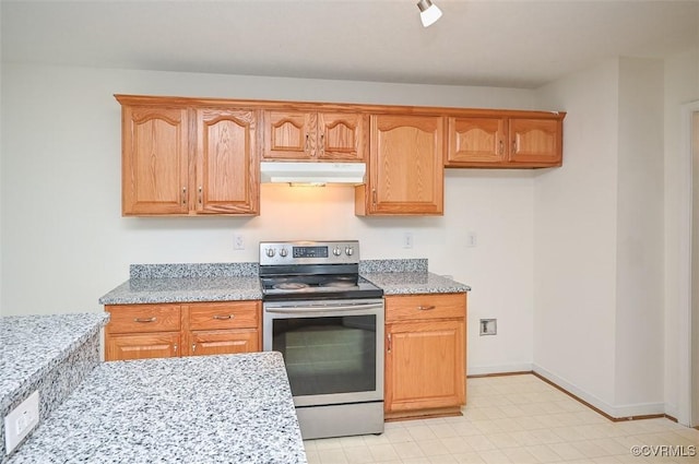 833 Tavern Green Rd, Glen Allen, VA 23060 - kitchen with stainless steel range with electric cooktop, under cabinet range hood, light stone counters, and baseboards