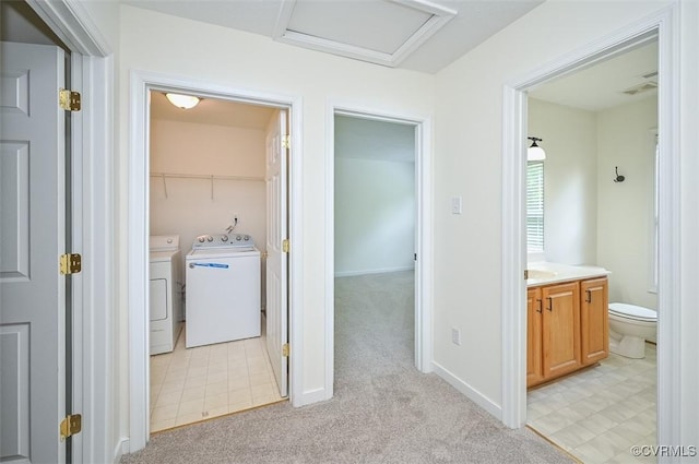 833 Tavern Green Rd, Glen Allen, VA 23060 - laundry room featuring separate washer and dryer, attic access, and light carpet