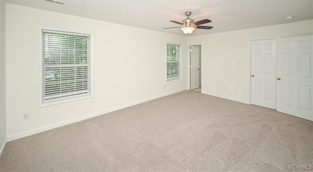 833 Tavern Green Rd, Glen Allen, VA 23060 - unfurnished bedroom with carpet flooring, multiple windows, baseboards, and a ceiling fan