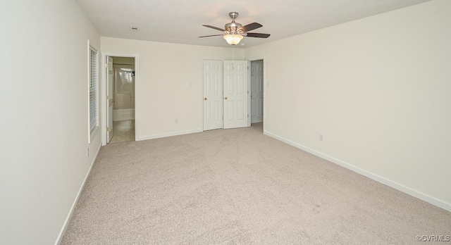 833 Tavern Green Rd, Glen Allen, VA 23060 - unfurnished bedroom with light carpet, baseboards, and connected bathroom