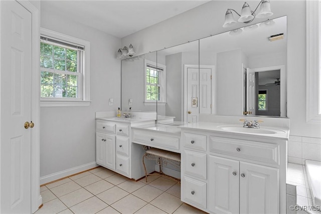 12055 Hadden Hall Dr, Chesterfield, VA 23838 - bathroom with healthy amount of natural light, double vanity, and tile patterned floors