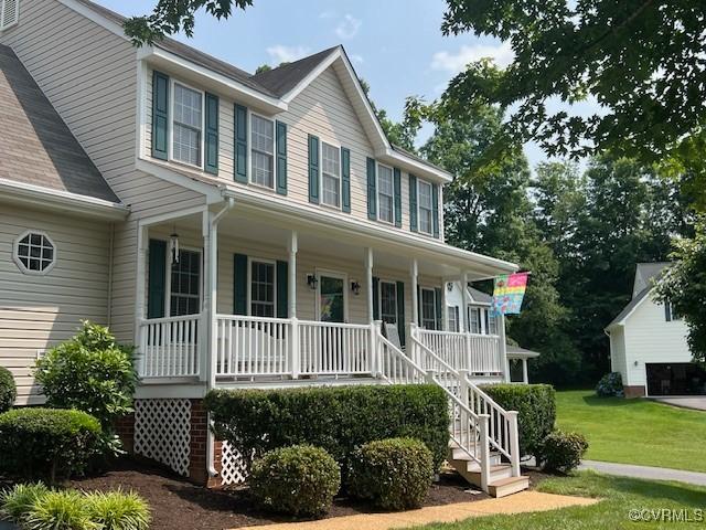 12819 Millstep Ter, Midlothian, VA 23112 - colonial house with covered porch, a front yard, and stairway