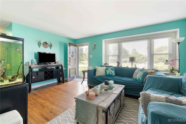 7143 Cherry Ln, Mechanicsville, VA 23111 - living room featuring wood finished floors