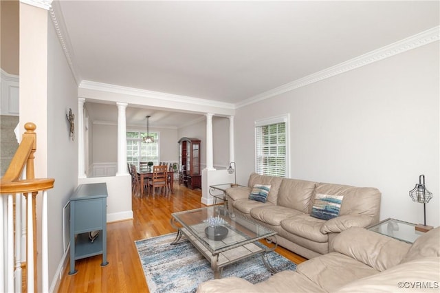 11407 Timber Point Dr, Chesterfield, VA 23838 - living area featuring ornate columns, crown molding, light wood-style floors, and baseboards