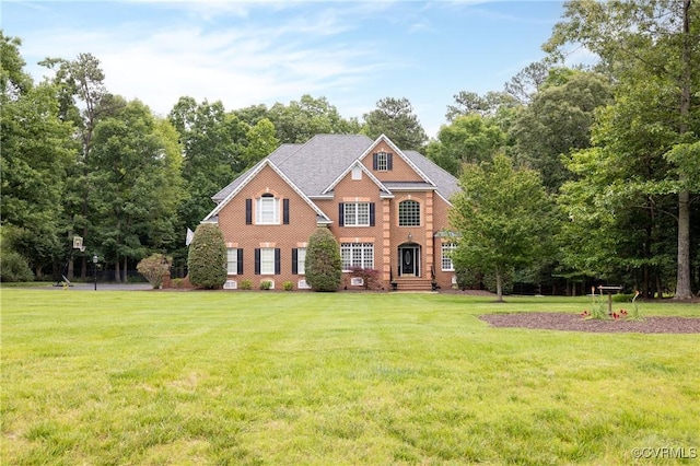 11407 Timber Point Dr, Chesterfield, VA 23838 - view of front facade with a front yard and brick siding