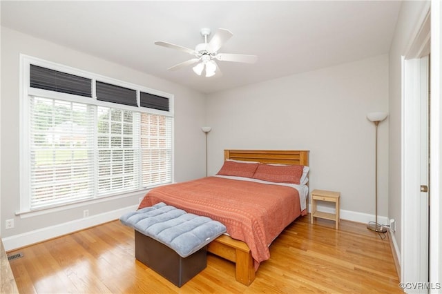 11407 Timber Point Dr, Chesterfield, VA 23838 - bedroom with baseboards, light wood-type flooring, and ceiling fan