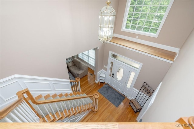 11407 Timber Point Dr, Chesterfield, VA 23838 - foyer with wood finished floors, healthy amount of natural light, a chandelier, and stairway