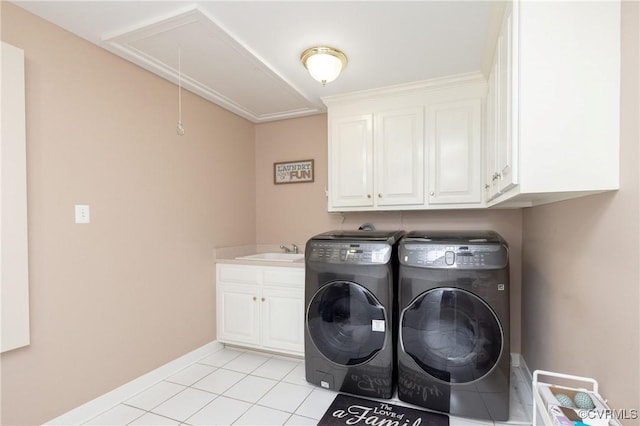 11407 Timber Point Dr, Chesterfield, VA 23838 - laundry room featuring attic access, washer and clothes dryer, cabinet space, baseboards, and light tile patterned flooring