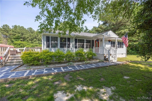 16701 Jolly Rd, Prince George, VA 23842 - back of house featuring a yard, crawl space, and a wooden deck