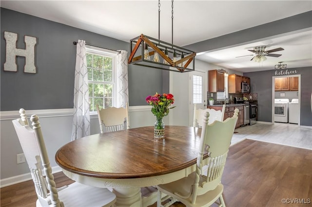 16701 Jolly Rd, Prince George, VA 23842 - dining area with independent washer and dryer, healthy amount of natural light, light wood finished floors, and baseboards