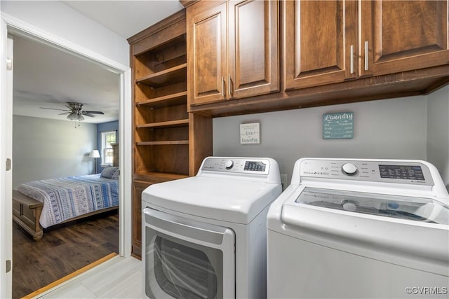 16701 Jolly Rd, Prince George, VA 23842 - laundry area with independent washer and dryer, cabinet space, and a ceiling fan