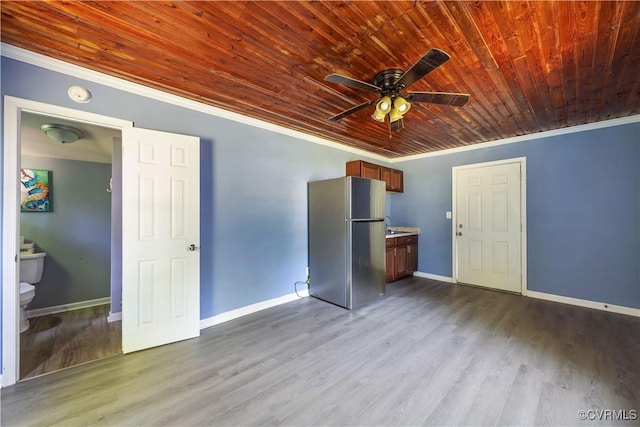 16701 Jolly Rd, Prince George, VA 23842 - unfurnished living room with crown molding, a ceiling fan, baseboards, dark wood-type flooring, and wooden ceiling