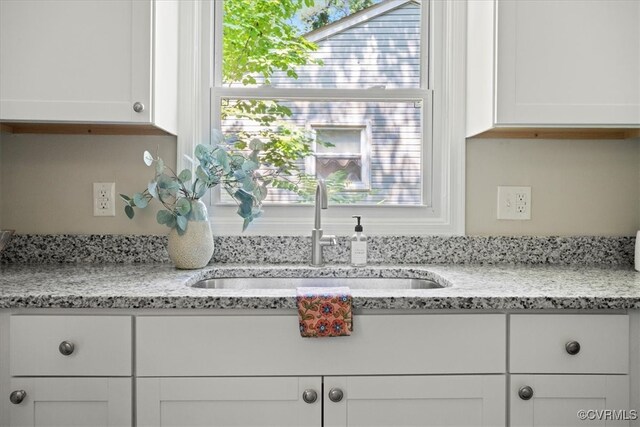 12 Wheelhouse Ct, Petersburg, VA 23805 - kitchen featuring white cabinets and light stone counters