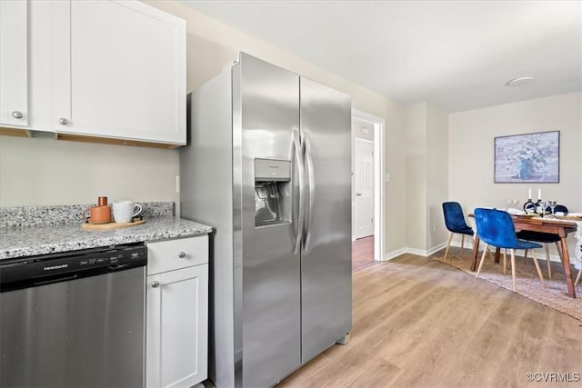 12 Wheelhouse Ct, Petersburg, VA 23805 - kitchen with stainless steel appliances, light wood-style floors, white cabinets, and light stone counters