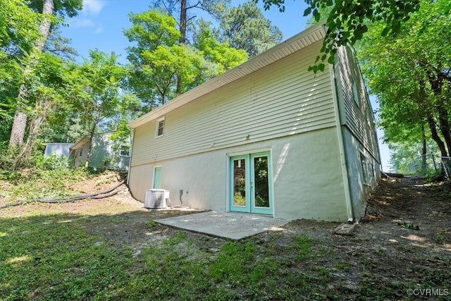 12 Wheelhouse Ct, Petersburg, VA 23805 - back of property featuring stucco siding and a patio area