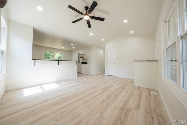 1602 Eden Ave, Henrico, VA 23231 - unfurnished living room with ceiling fan, recessed lighting, light wood finished floors, vaulted ceiling, and baseboards
