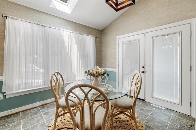 12912 Cottage Mill Pl, Midlothian, VA 23114 - dining area featuring lofted ceiling, a skylight, and tile patterned floors