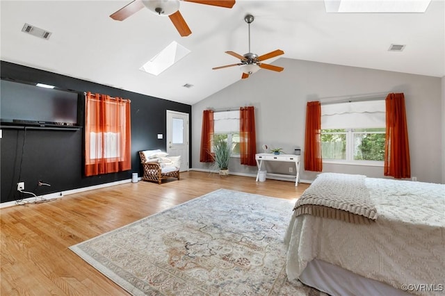 12912 Cottage Mill Pl, Midlothian, VA 23114 - bedroom with a skylight, wood finished floors, vaulted ceiling, and a ceiling fan