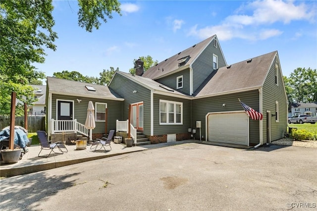 12912 Cottage Mill Pl, Midlothian, VA 23114 - back of property featuring asphalt driveway, a garage, and a shingled roof