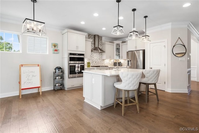 6800 Alabaster Ln, Chesterfield, VA 23234 - kitchen with appliances with stainless steel finishes, wall chimney range hood, tasteful backsplash, light countertops, and a chandelier