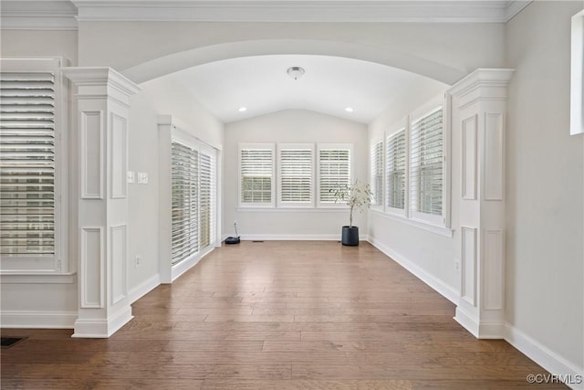 6800 Alabaster Ln, Chesterfield, VA 23234 - empty room featuring arched walkways, hardwood / wood-style floors, plenty of natural light, vaulted ceiling, and crown molding