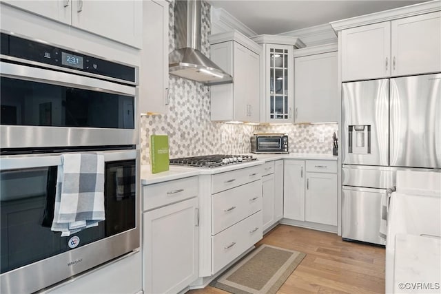 6800 Alabaster Ln, Chesterfield, VA 23234 - kitchen with stainless steel appliances, wall chimney exhaust hood, light countertops, and white cabinetry