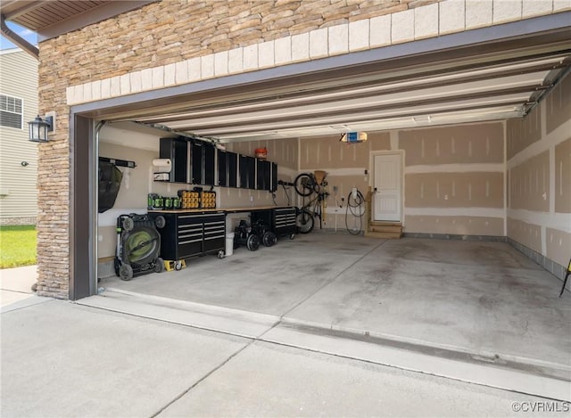 6800 Alabaster Ln, Chesterfield, VA 23234 - garage featuring a garage door opener and driveway
