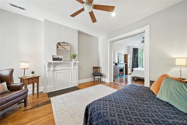 323 N 27th St, Richmond, VA 23223 - bedroom with wood finished floors