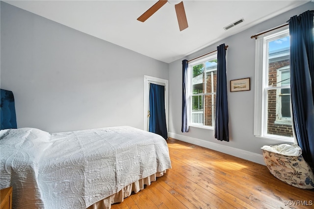 323 N 27th St, Richmond, VA 23223 - bedroom with light wood finished floors, a ceiling fan, and vaulted ceiling
