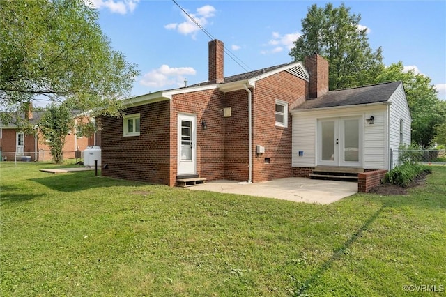 602 Trellis Ln, Henrico, VA 23075 - rear view of house featuring a chimney, french doors, brick siding, and entry steps