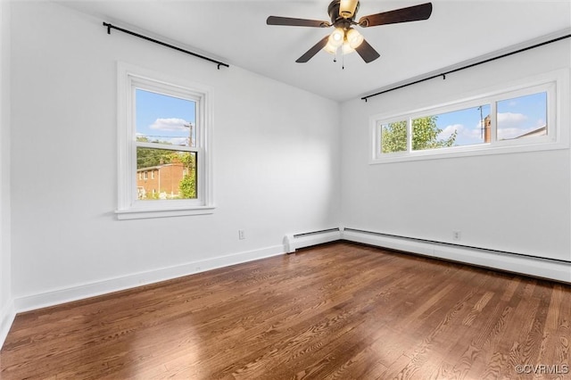 602 Trellis Ln, Henrico, VA 23075 - spare room featuring wood finished floors, ceiling fan, and baseboards