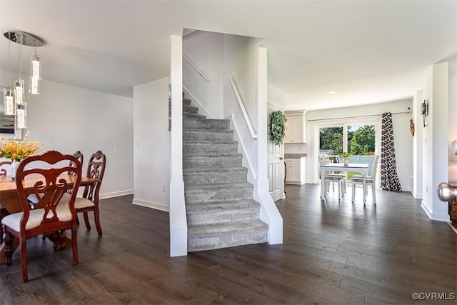203 Pointers Dr, West Point, VA 23181 - staircase with wood finished floors and baseboards