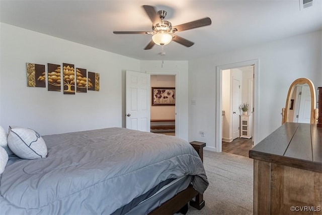 203 Pointers Dr, West Point, VA 23181 - bedroom with dark carpet, ceiling fan, and baseboards