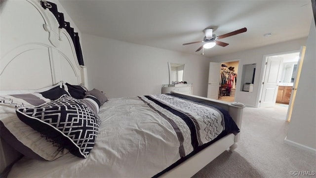 5324 Sandy Ridge Ct, Chesterfield, VA 23832 - carpeted bedroom featuring a spacious closet, a closet, connected bathroom, baseboards, and a ceiling fan