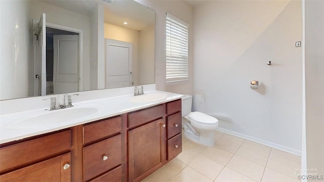 5324 Sandy Ridge Ct, Chesterfield, VA 23832 - full bath featuring double vanity, toilet, tile patterned flooring, and baseboards