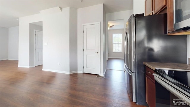 5324 Sandy Ridge Ct, Chesterfield, VA 23832 - kitchen featuring dark wood finished floors, baseboards, range, a ceiling fan, and brown cabinetry