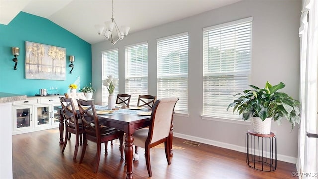5324 Sandy Ridge Ct, Chesterfield, VA 23832 - dining room featuring a chandelier, vaulted ceiling, wood finished floors, and baseboards