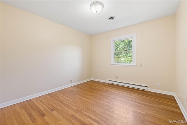 4200 Esposito Pl, Prince George, VA 23875 - spare room featuring baseboard heating, light wood finished floors, and baseboards