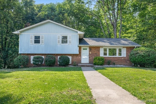 4200 Esposito Pl, Prince George, VA 23875 - tri-level home featuring a front lawn and brick siding