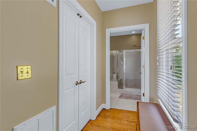 241 Tranquility Rd, Reedville, VA 22539 - hallway featuring baseboards and light wood finished floors