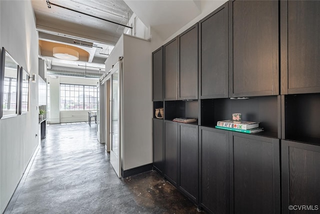 101 W Marshall St Unit U47, Richmond, VA 23220 - hallway featuring baseboards and concrete floors