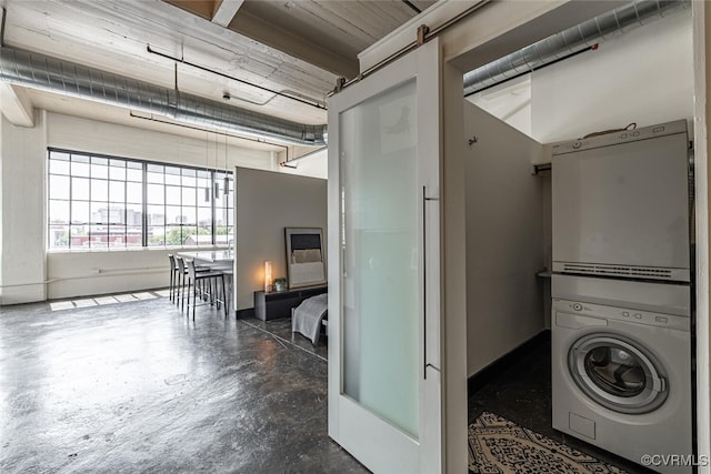 101 W Marshall St Unit U47, Richmond, VA 23220 - washroom featuring estacked washer and dryer