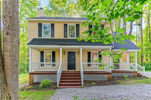 4381 Three Bridge Rd, Powhatan, VA 23139 - view of front of property with a porch, a chimney, and roof with shingles