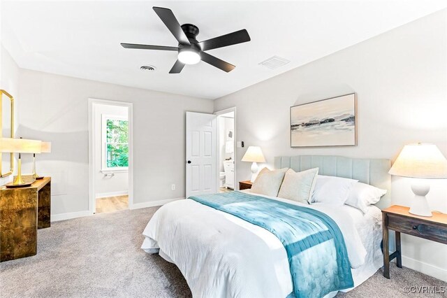 4381 Three Bridge Rd, Powhatan, VA 23139 - bedroom with carpet floors, baseboards, ensuite bathroom, and a ceiling fan