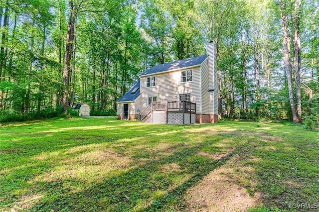 4381 Three Bridge Rd, Powhatan, VA 23139 - back of house with a chimney, a deck, a lawn, and stairway
